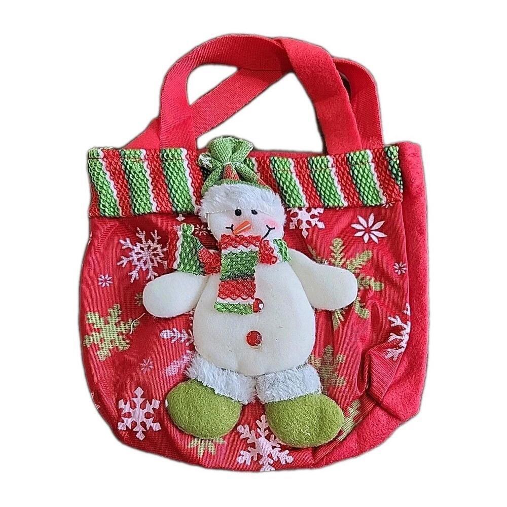 Handcrafted Christmas-themed gift or candy bag featuring a 3D snowman decoration
